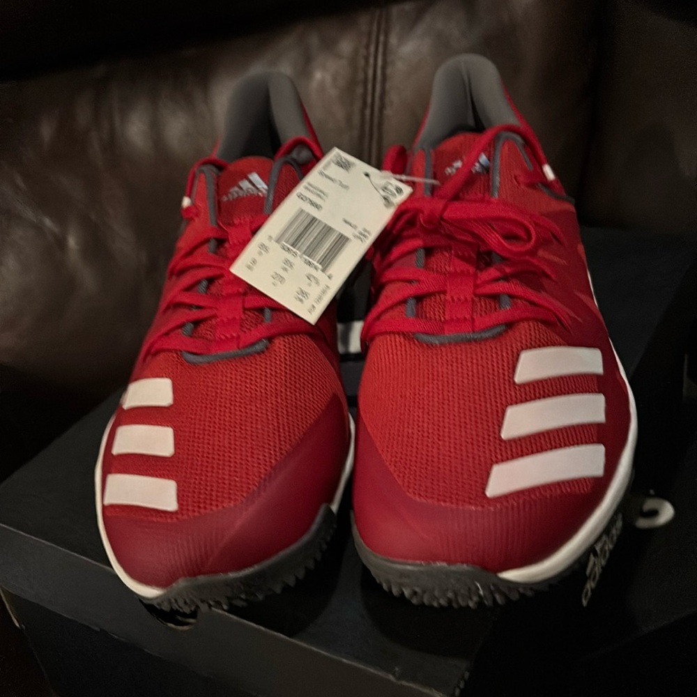 NIB men’s Adidas Speed Turf training shoes.